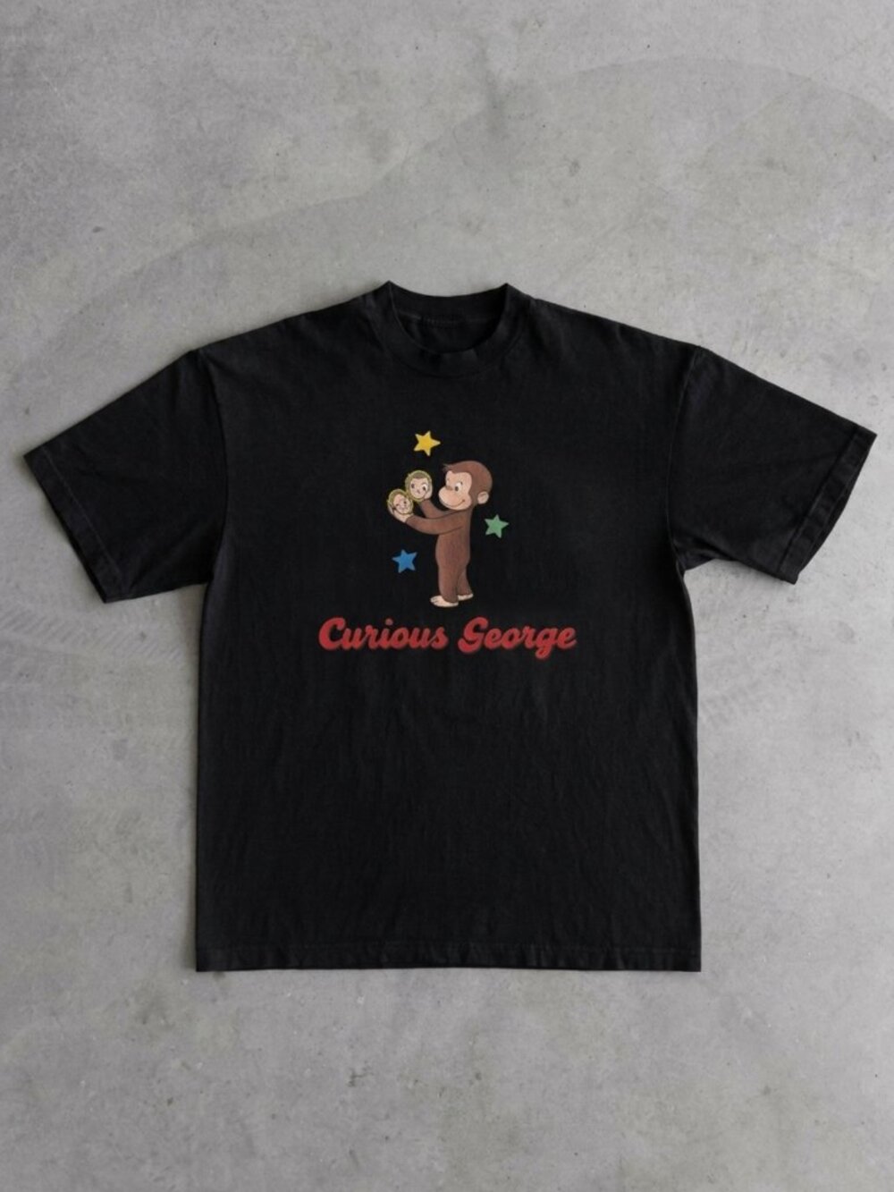 Curious George Peeling a Banana Modern Cartoon with Logo Toddler T-shirt